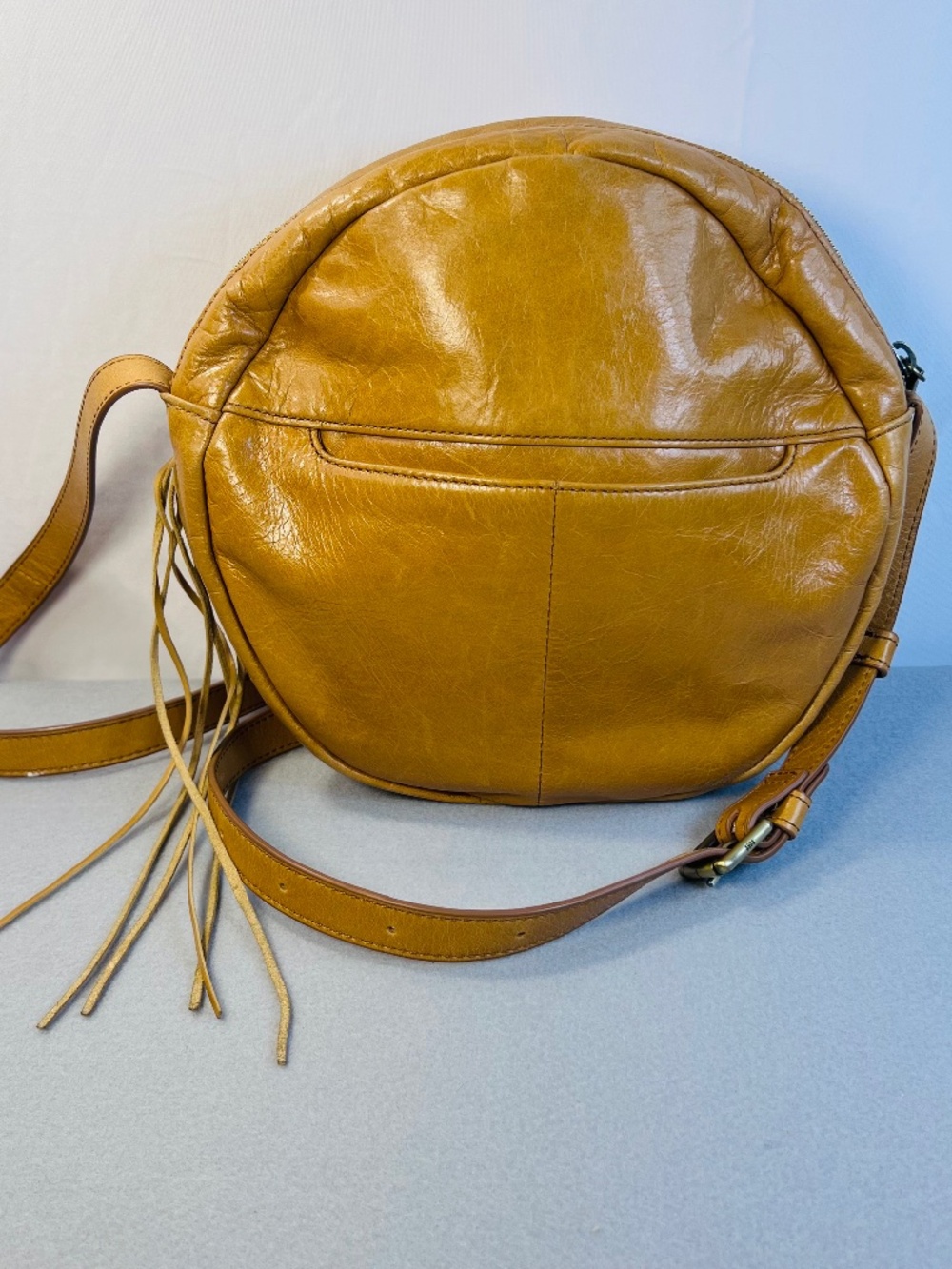 Brown Hobo Canteen Crossbody Boho Fringe Tassel. Zip Closure. 10 in Diameter